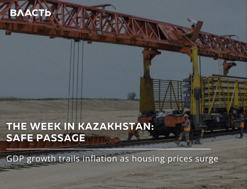 A construction train is on the railroad track with workers nearby and the text "ВЛАСТЬ THE WEEK IN KAZAKHSTAN: SAFE PASSAGE GDP growth trails inflation as housing prices surge."