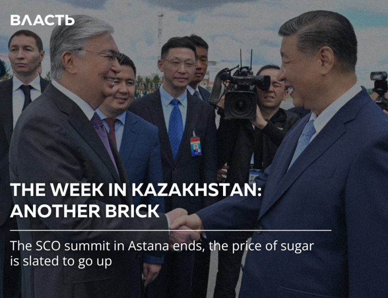 A group of men in suits are shaking hands, with a camera crew in the background and text overlaying the image that reads, 'ВЛАСТЬ,' 'THE WEEK IN KAZAKHSTAN: ANOTHER BRICK,' and 'The SCO summit in Astana ends, the price of sugar is slated to go up.'